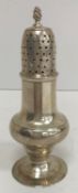 A late 18th Century silver pepper (London, indistinctly marked), 13 cm high, 1.