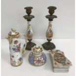 A pair of 19th Century porcelain and cast brass baluster shaped candlesticks,