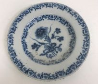 A collection of various Delft ware including a small circular plate with central floral spray