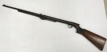 A BSA Model D .22 air rifle with BSA mark to the hatched stock (Serial No.