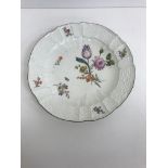 A 19th Century Meissen plate with basket weave border and brown lined rim,