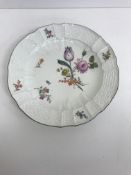 A 19th Century Meissen plate with basket weave border and brown lined rim,