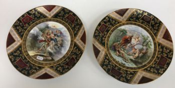 A pair of late 19th Century Vienna decorative plates with transfer decoration depicting Classical