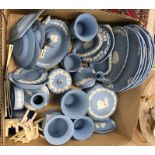 A collection of pale blue Jasperware including vases, trinket boxes, mantel clock, Christmas plates,