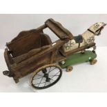 A vintage Triang dappled horse and cart, the horse on pull along base,
