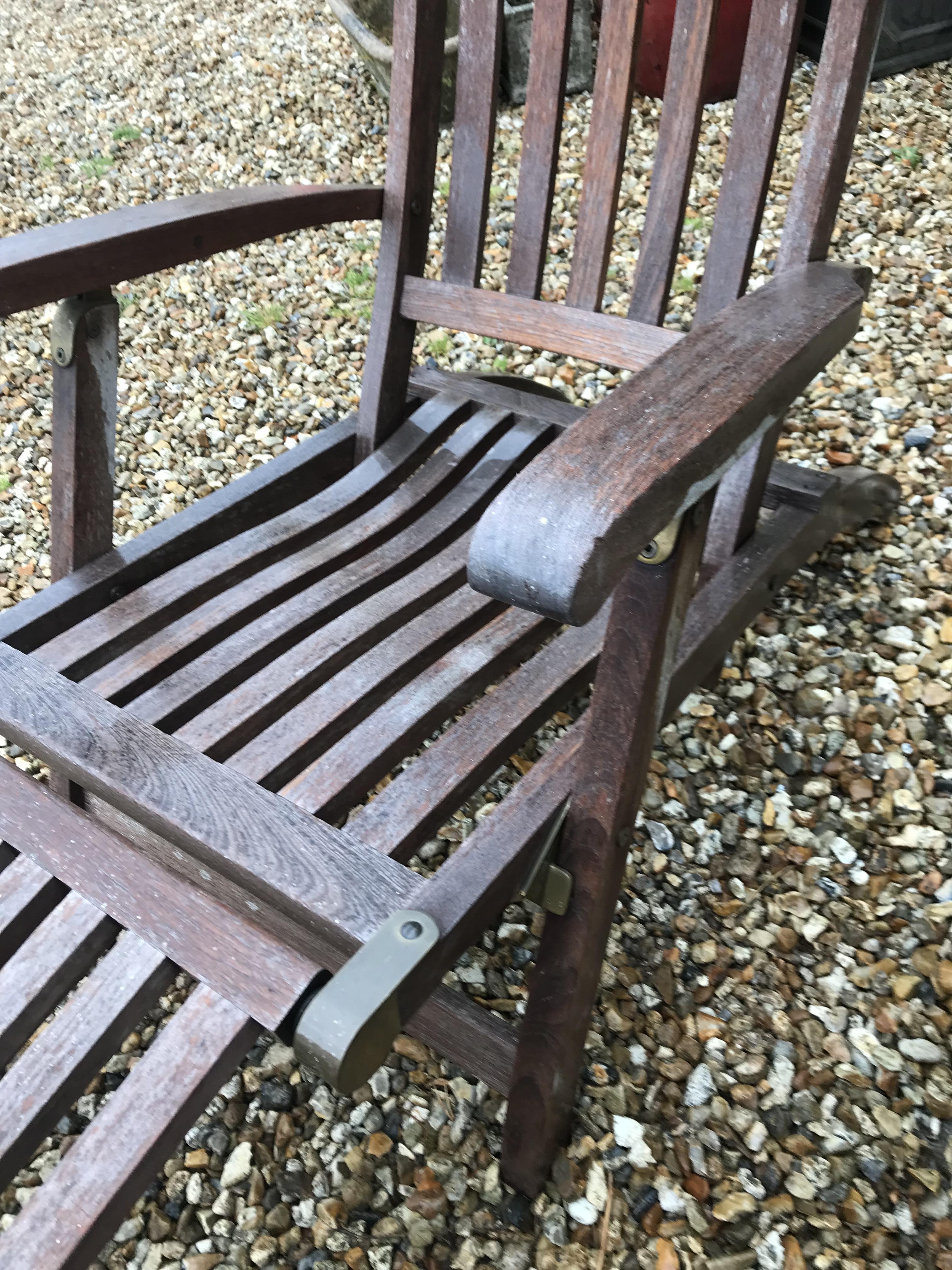 A pair of teak slatted garden steamer type chairs CONDITION REPORTS Have general - Image 11 of 11
