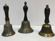 Three various wooden handled hand bells 20.
