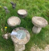 A collection of various stone and reconstituted stone ornaments including sundial, bird bath,