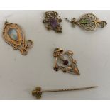 A collection of four 9 carat gold and pearl and stone set Edwardian pendants of openwork design