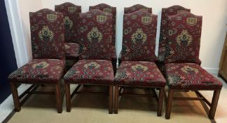 A set of nine modern upholstered Georgian style high back dining chairs on square moulded supports