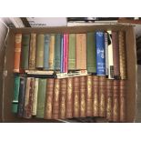 Nine boxes of various books to include various Bibles, references, novels,