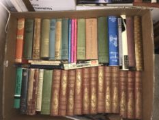 Nine boxes of various books to include various Bibles, references, novels,