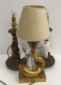 A pair of wooden gilt decorated table lamps with wrythen and acanthus leaf decoration 27 cm high