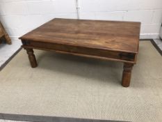 A modern Indian hardwood coffee table with wrought iron decoration 135 cm long x 84 cm wide x 46 cm