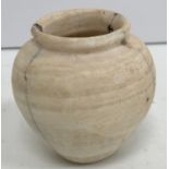 A small Egyptian alabaster vase (cracked) circa 2000 B.C., 6.