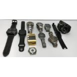 A collection of nine various gent's wristwatches including Jaguar stainless steel cased wristwatch,