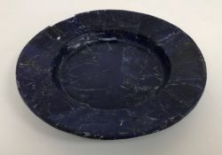 A lapis lazuli dish of circular form, formed from various shards 22.