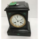 A Victorian black slate mantel clock with malachite decoration,