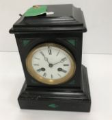 A Victorian black slate mantel clock with malachite decoration,