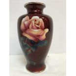 A 20th Century red ground cloisonne vase with rose spray decoration,