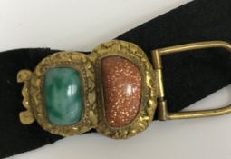A Chinese jade belt hook decorated with dragon head and Shilong,