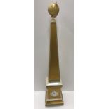 A Rosenthal for Versace porcelain cased mantel clock of obelisk form with globe finial,