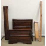 A modern mahogany single sleigh bed with Maple and Co base 98 cm wide x approx.