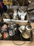 Four boxes of sundry decorative china etc to include resin figure of an Egyptian,