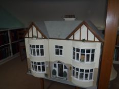 A modern dolls house "Fairbanks" as a double fronted bay windowed townhouse with garden to rear,