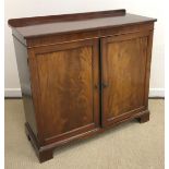 A late Victorian mahogany drop leaf Sutherland table,