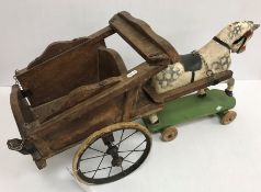 A vintage Triang dappled horse and cart, the horse on pull along base,