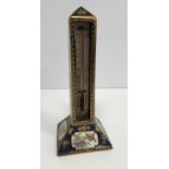 A Booths chinoiserie pattern pottery thermometer stand of column form set with a Negretti & Zambra