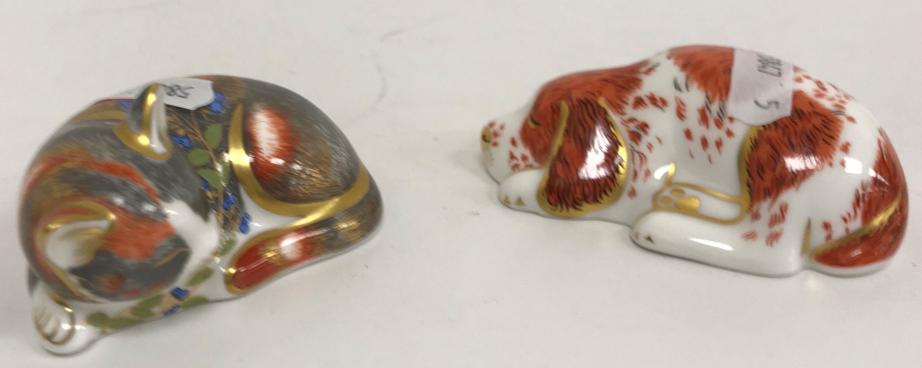 Two Royal Crown Derby figures including Collectors' Guild Exclusive "Catnip kitten" and Collectors'