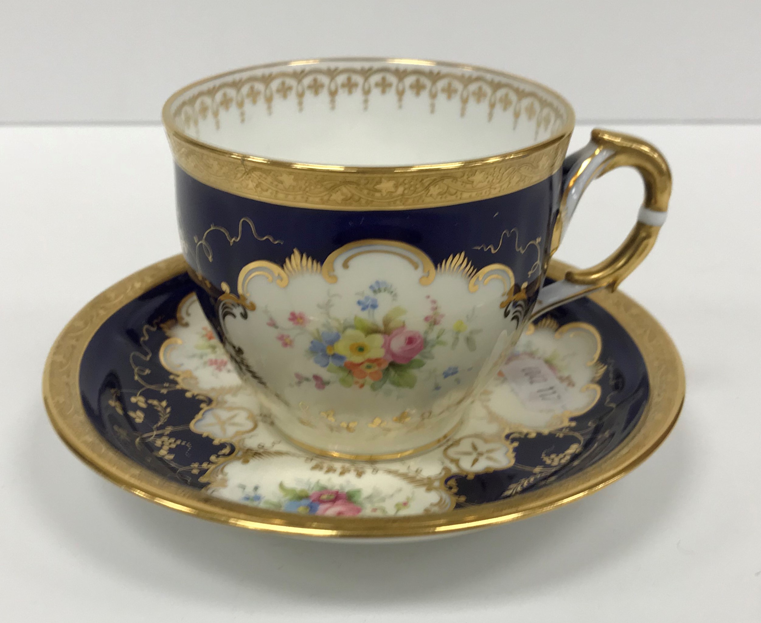 A Mintons floral spray blue and gilt decorated part tea service comprising six cups and saucers, - Image 2 of 25