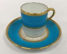 A Mintons bleu celeste and gilt decorated coffee set comprising fifteen cups and thirteen saucers
