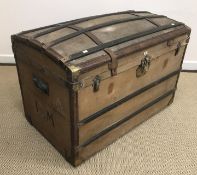 A 19th Century French strap work decorated studded leather bound canvas covered dome top trunk,