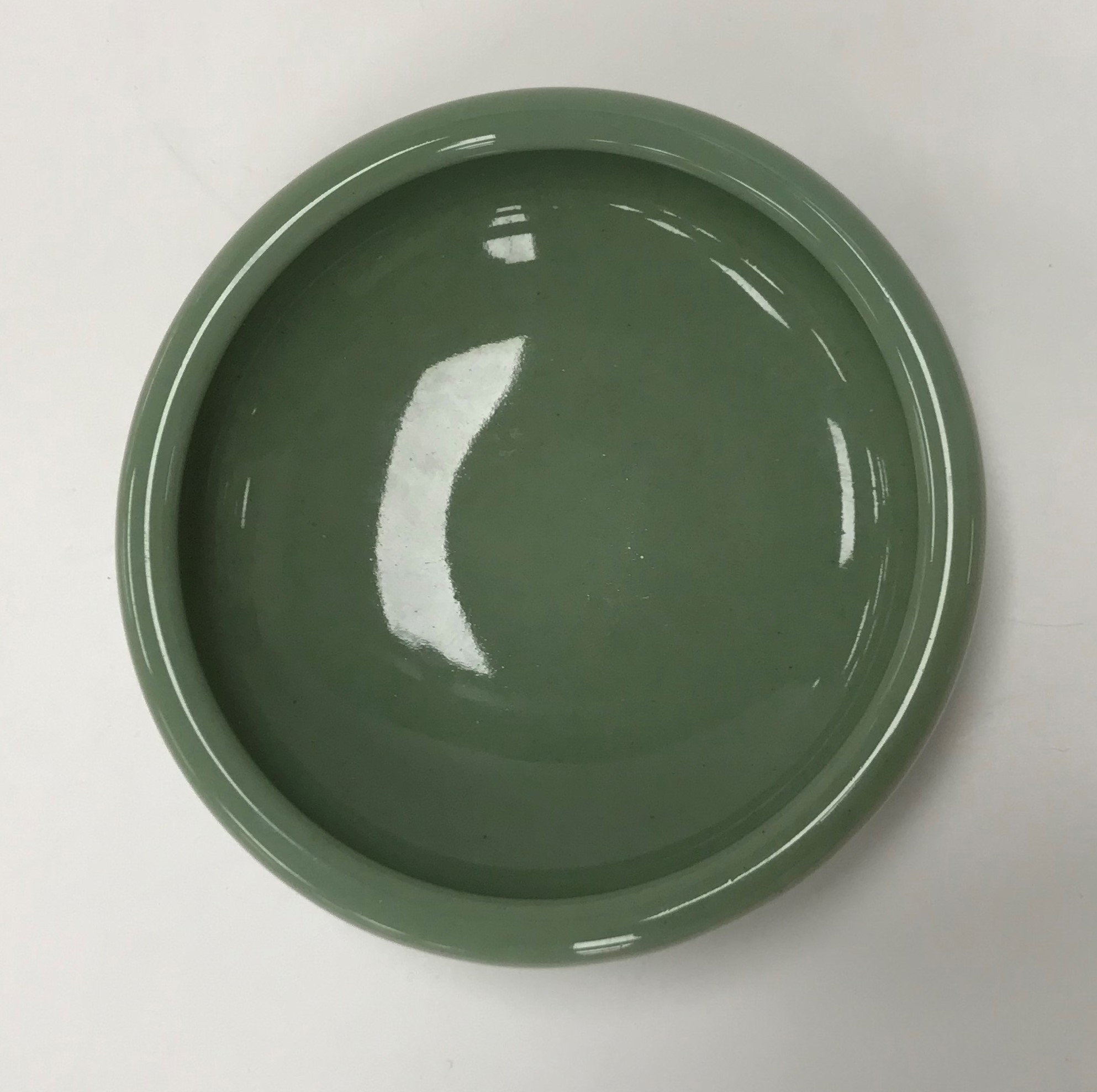 A Royal Copenhagen celadon glazed bowl of plain form raised on a shallow circular foot bearing blue - Image 2 of 3