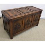 A 20th Century oak coffer in the 17th Century style,