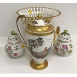 A pair of 19th Century porcelain floral spray decorated pot pourri pots and covers with yellow rose