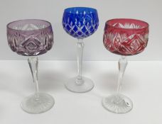 A collection of overlaid cut glass hocks, including six pineapple cut blue overlaid,