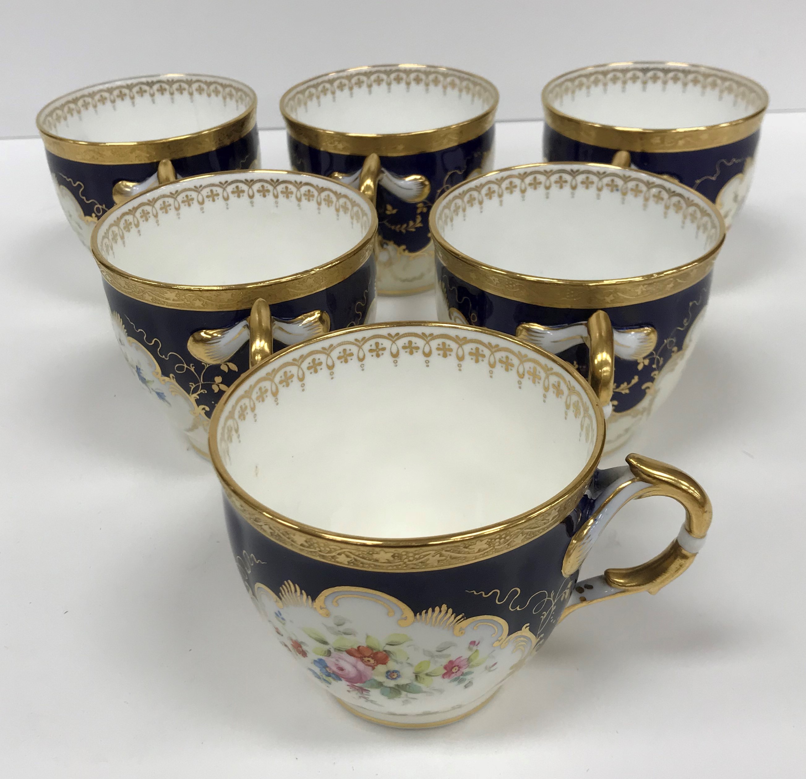 A Mintons floral spray blue and gilt decorated part tea service comprising six cups and saucers, - Image 4 of 25