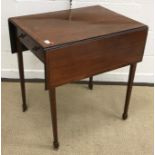 A Dominion Organ and Piano Co pump organ and stool, a mahogany drop leaf Pembroke table x 2,
