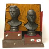 A pair of Royal Doulton black basalt busts of Her Majesty Queen Elizabeth II and HRH The Duke of