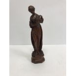 A 19th century carved boxwood figure of "Judith with the head of Holofernes",