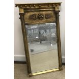 A 19th Century carved giltwood and gesso pier glass of typical form 50 cm wide x 85 cm high