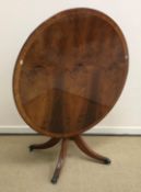 A Regency style yew wood breakfast table,