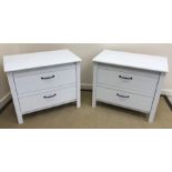 A pair of modern white laminated chests of two drawers 80 cm wide x 68.