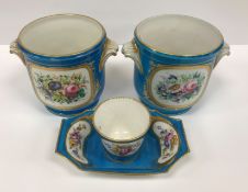 A pair of Sèvres bleu celeste and hand painted cachepots with figural and jewelled decoration the