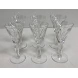 A set of six Waterford Crystal facet cut "Sheila" pattern sherries with conical shaped bowls raised
