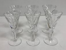A set of six Waterford Crystal facet cut "Sheila" pattern sherries with conical shaped bowls raised